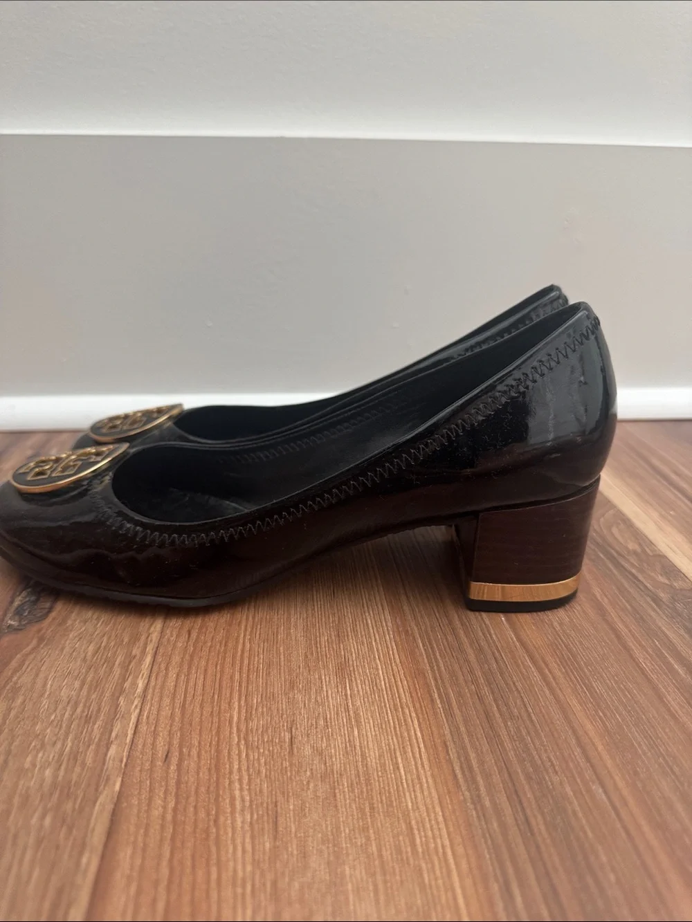 Tory Burch Black Patent Leather Block Heel Pumps with Gold Logo Medallion